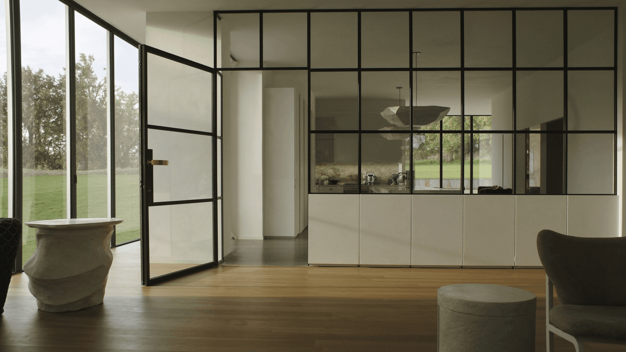 Verrière atelier maison Sénart ville nouvelle Saint-Pierre-du-Perray 91280 Golf de Sénart — profil acier S235JR T 40 × 40 mm patine bronze antique sur mesure Yann + laiton fait main fonderie Bois-d'Arcy + verre clair feuilleté Saint-Gobain Diamant 8+8 mm — atelier AZ Bruyères 65 km