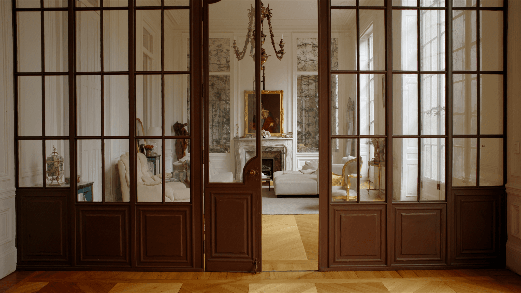 Verrière atelier hôtel particulier Belle Époque Paris 17e Monceau — profil acier 40 mm patine bronze antique sur mesure + laiton fait main fonderie Bois-d'Arcy + verre clair feuilleté Saint-Gobain Diamant 8+8 mm — ABF Monceau-Friedland accepté 1ère instruction