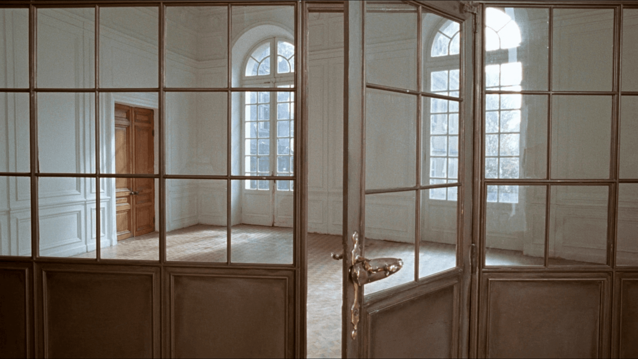 Verrière atelier Châtillon 92320 Plateau vue Paris — profil acier S235JR T 40 × 40 mm patine bronze antique par Yann + vitrage Saint-Gobain Diamant 8+8 mm + laiton fait main fonderie Bois-d'Arcy 32 km — pavillon Belle Époque proche église Saint-Philippe-Saint-Jacques 1862