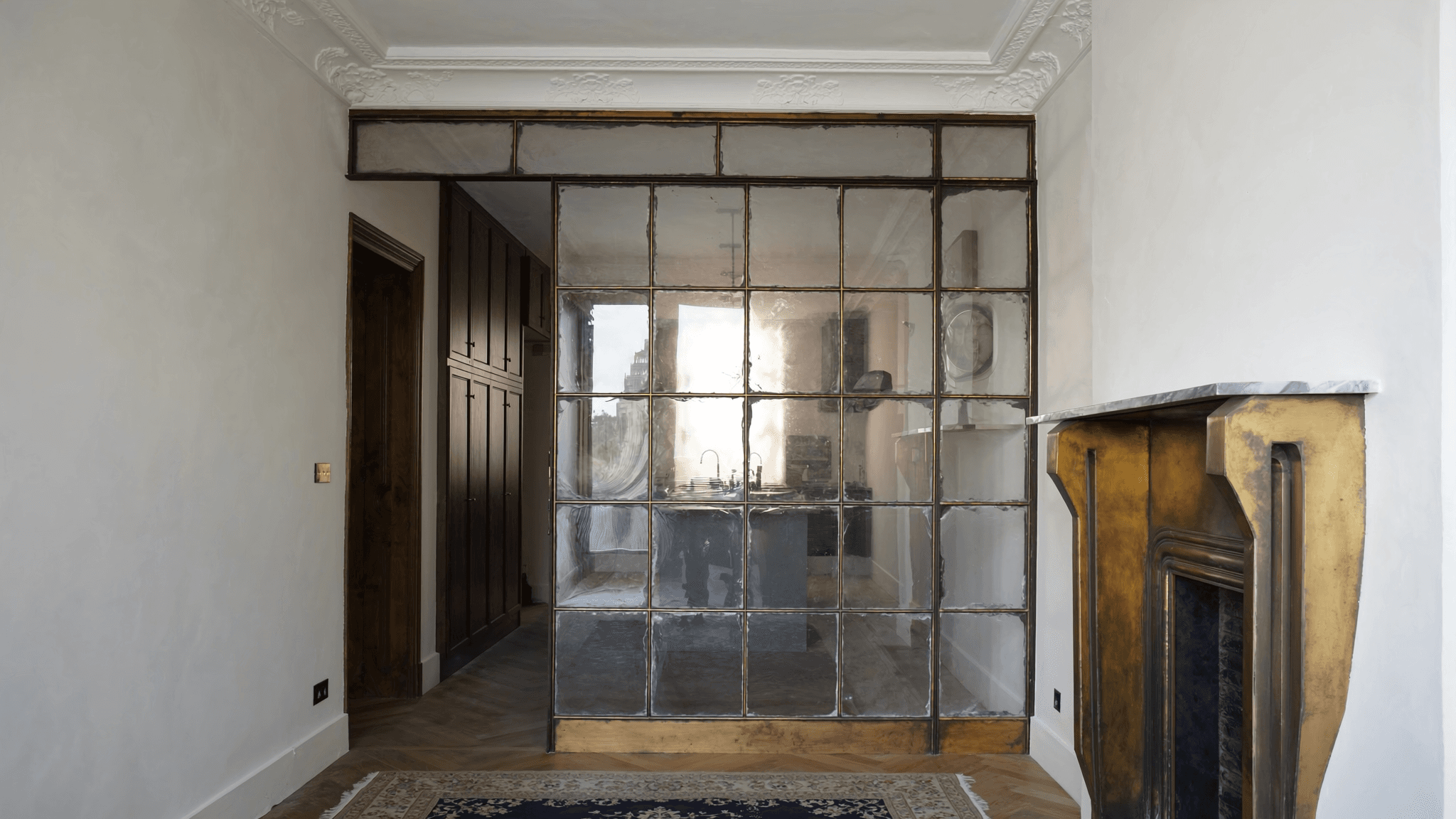 Verrière atelier maison Belle Époque Montrouge 92120 Centre — profil acier S235JR T 40 × 40 mm patine bronze antique par Yann + vitrage Saint-Gobain Diamant 8+8 mm + filière laiton fait main fonderie Bois-d'Arcy 32 km — quartier Beffroi 1932 Coucouzelis Art Déco MH 2010