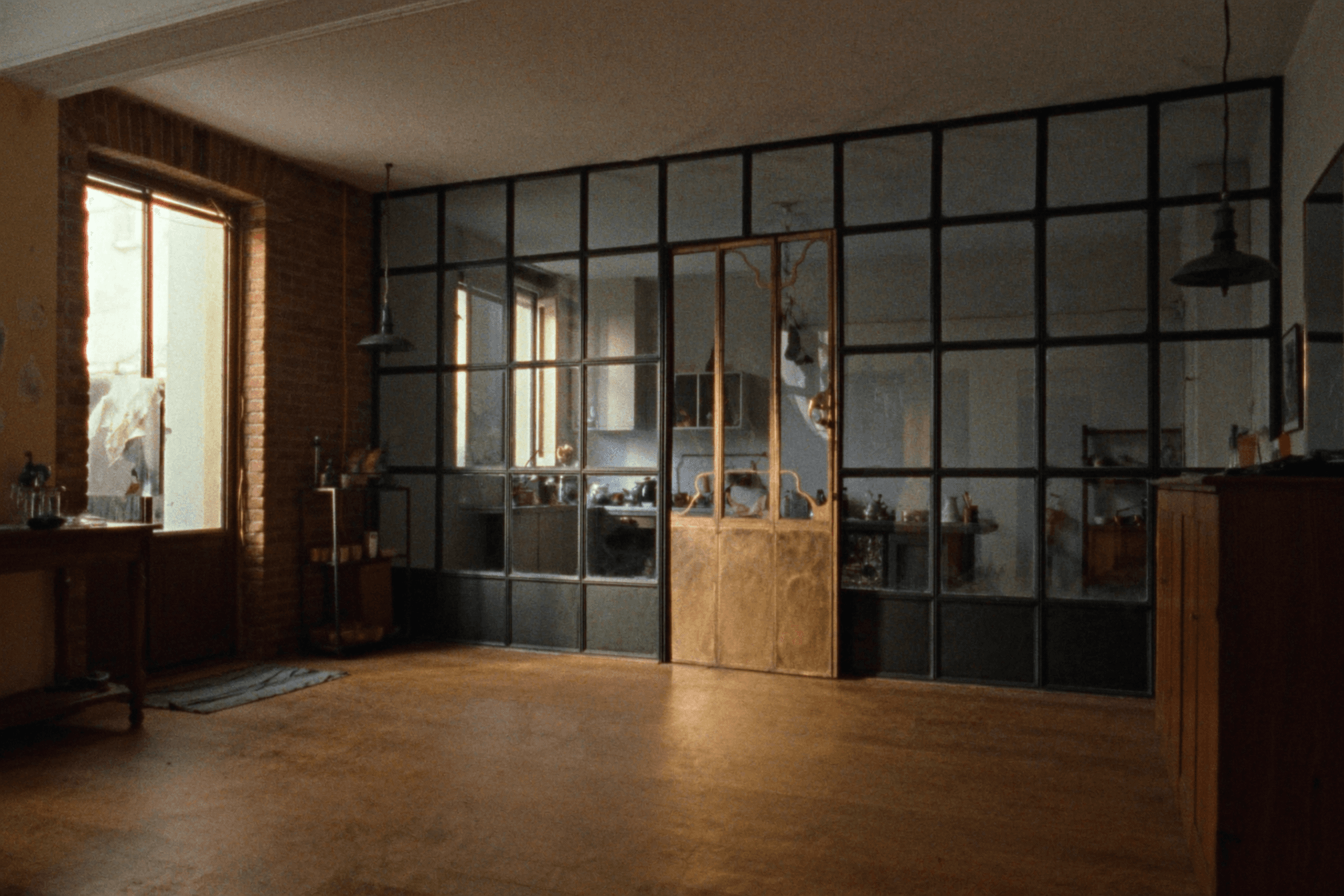 Verrière atelier Chelles 77500 Seine-et-Marne — maison faubourg brique XIXe rue de Gournay — profil acier S235JR T 40 mm patine bronze antique sur mesure + laiton fait main fonderie Bois-d'Arcy + verre clair feuilleté Saint-Gobain Diamant 8+8 mm — ABF musée Bonno + église Sainte-Croix accepté 1ère instruction
